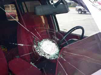 used car with cracked windshield